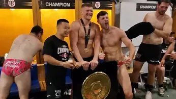 Rugby Stars Lock Lips. How About That Locker Room Victory Kiss?