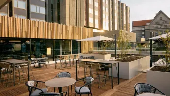 Prague’s Landmark Riverside Brutalist Hotel Reopens As Fairmont, Combining History and Upscale Design